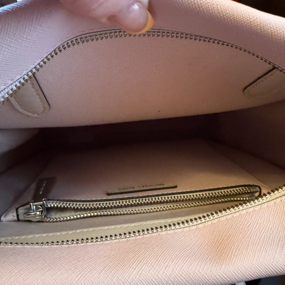 Brand new used only once pink leather Michael Kors backpack